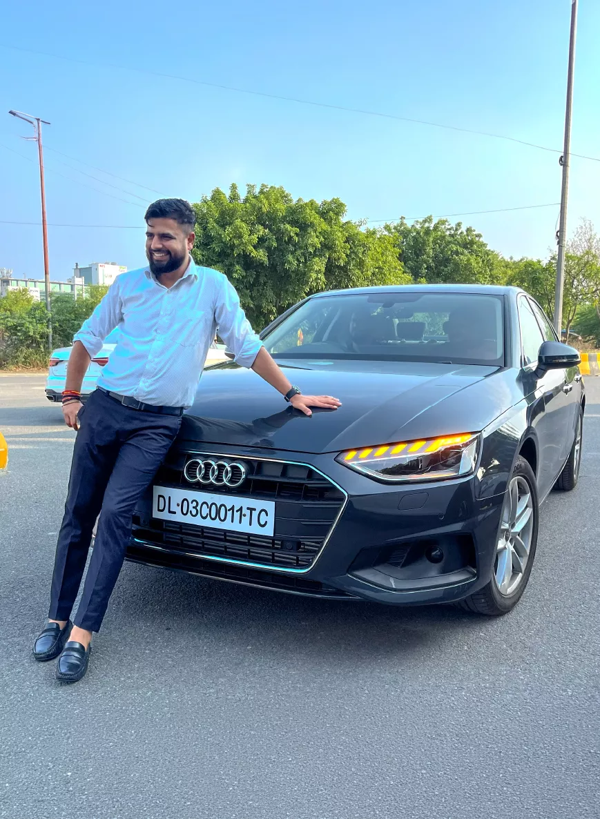 Employee receiving Audi car keys