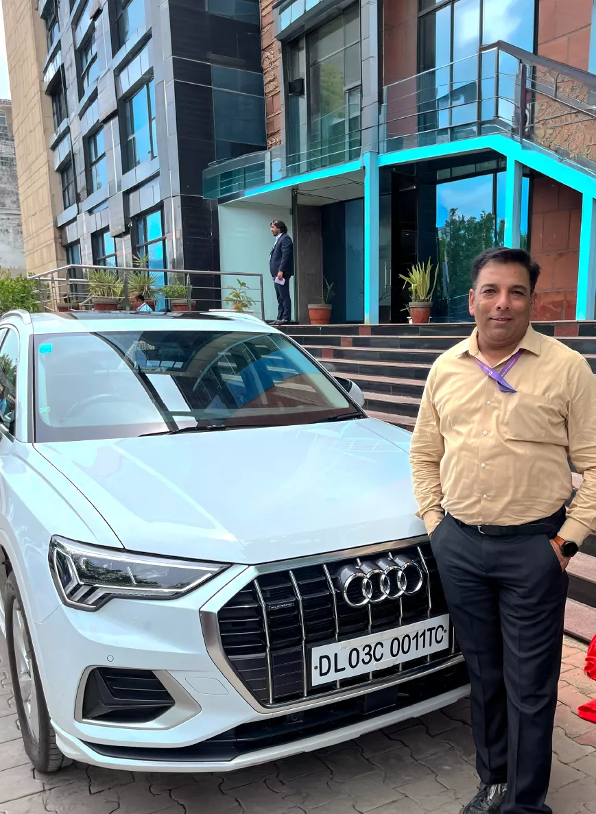 Team celebrating an Audi car award